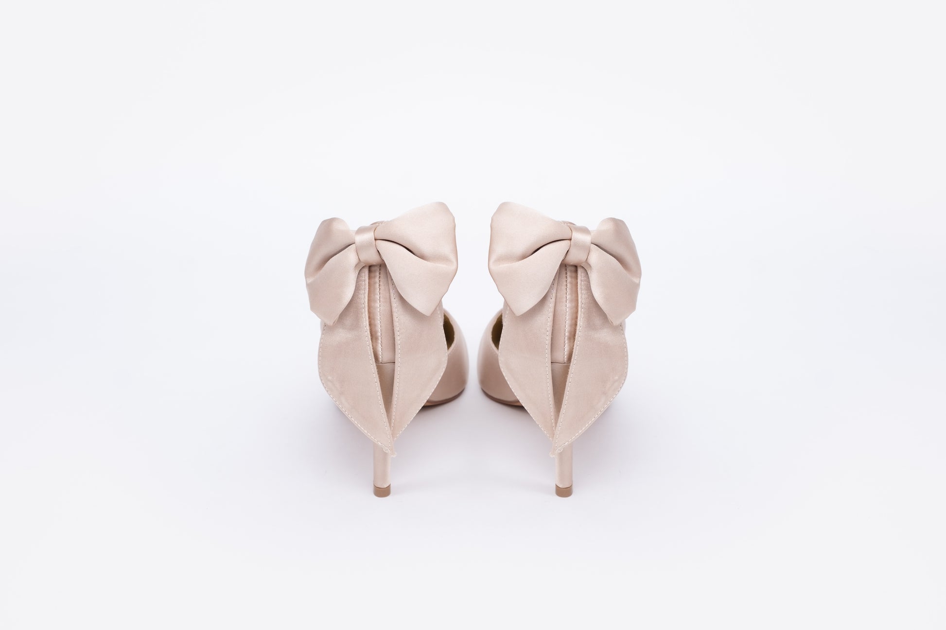 Back view of Annie Court in Champagne. Beautiful womens formal shoe with bow detail. Available in European sizes 42-46