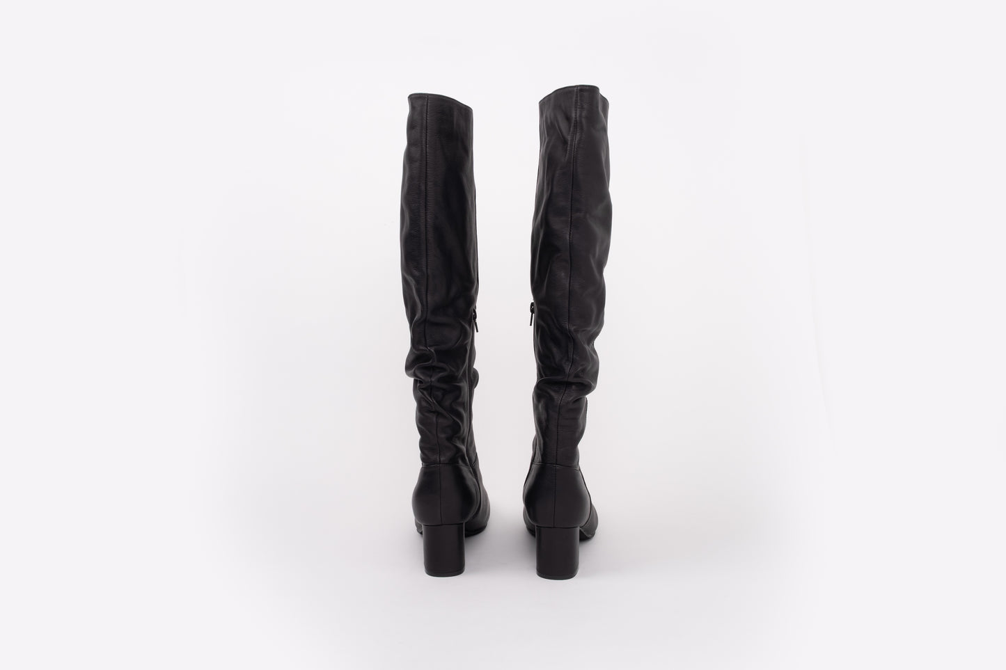 back shot of womens heeled leather knee high ankle boot in larger sizes 8-12