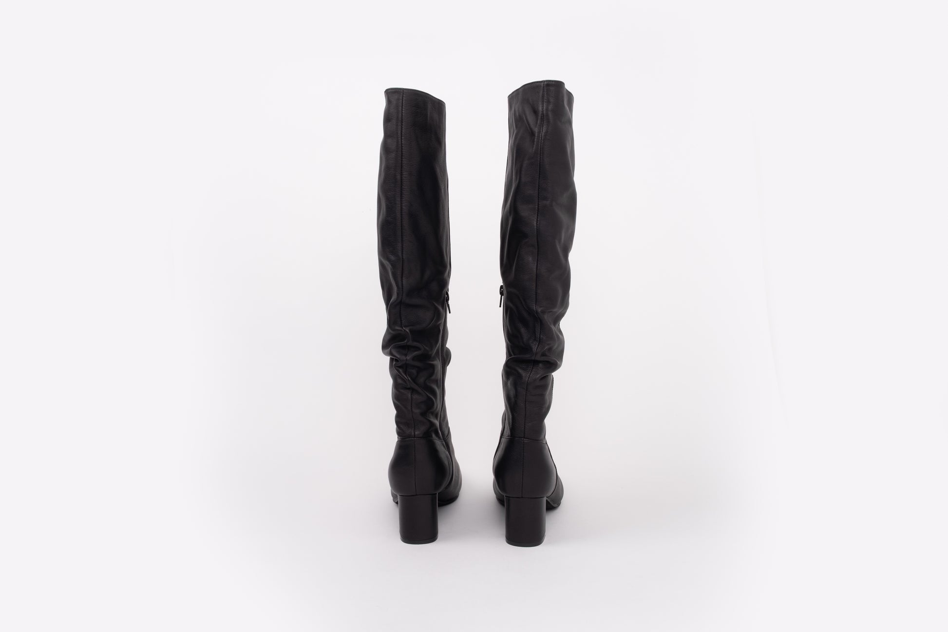 back shot of womens heeled leather knee high ankle boot in larger sizes 8-12