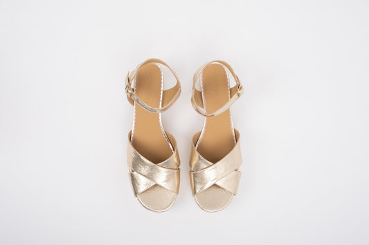 Aerial shot of womens large size gold block heeled sandal in sizes 8 9 10 11 12 