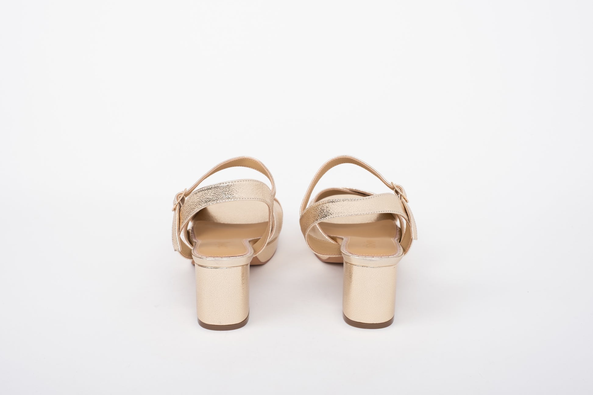 Back shot of gold block heeled leather sandal. available in sizes 42 43 44 45 46 wide fit