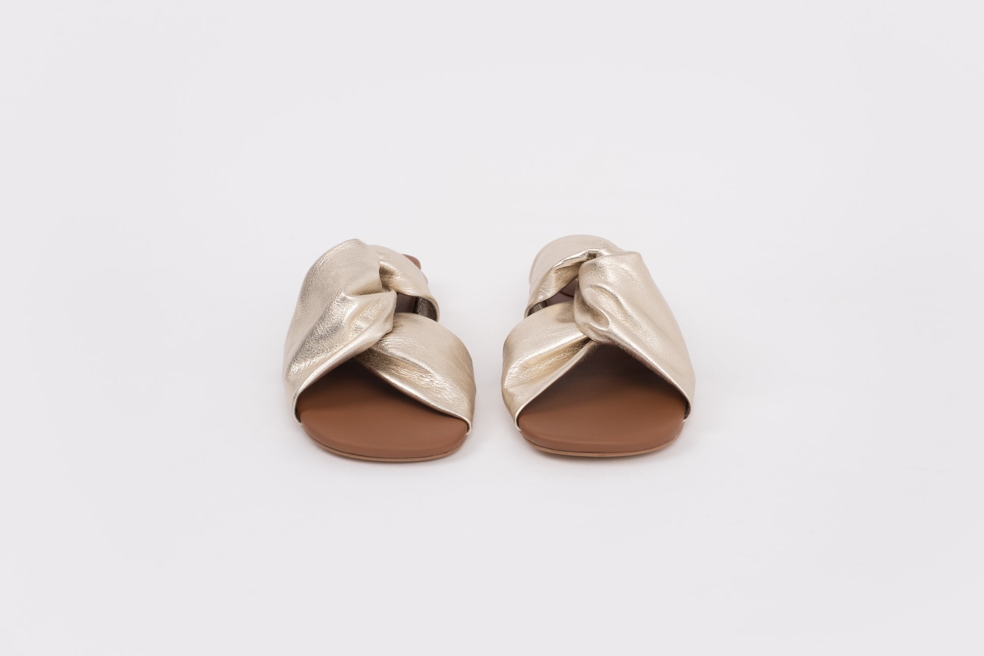 Front shot of gold lip on sandal available in larger womens sizes 42-46