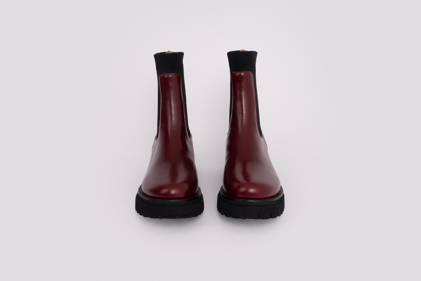 Front view of Marnie Boot, in Oxblood red. A flat leather ankle boot available in larger sizes 42-46