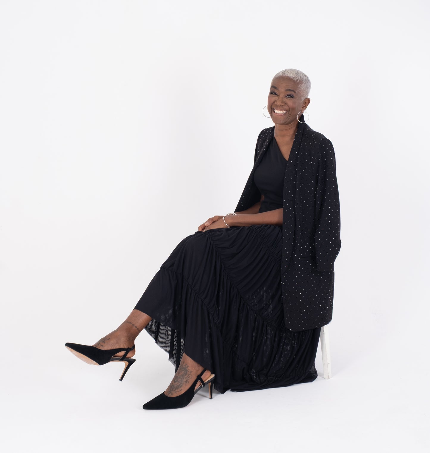 Women modelling black suede slingback heels in larger sizes 42-46, standard and wide fit