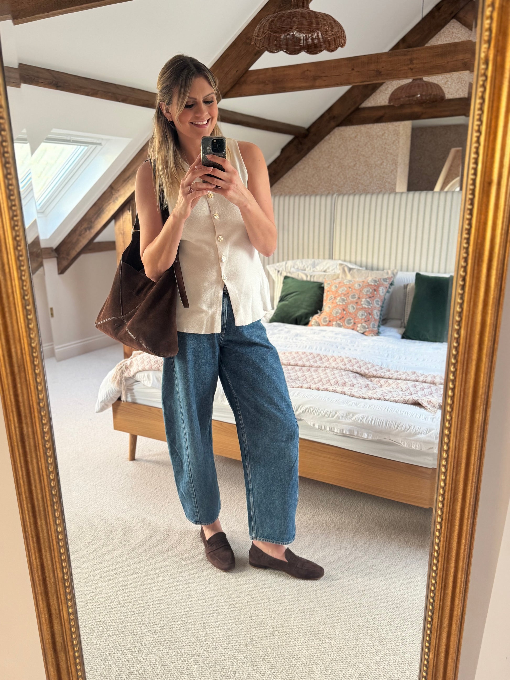 Tall women modelling chocolate brown suede stretch-back loafer in large sizes 8-12