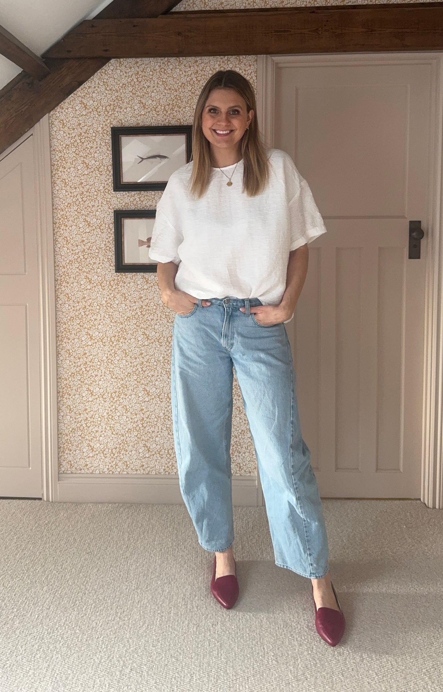 Tall woman wearing burgundy leather felt shoes in larger sizes 8 9 10 11 12 