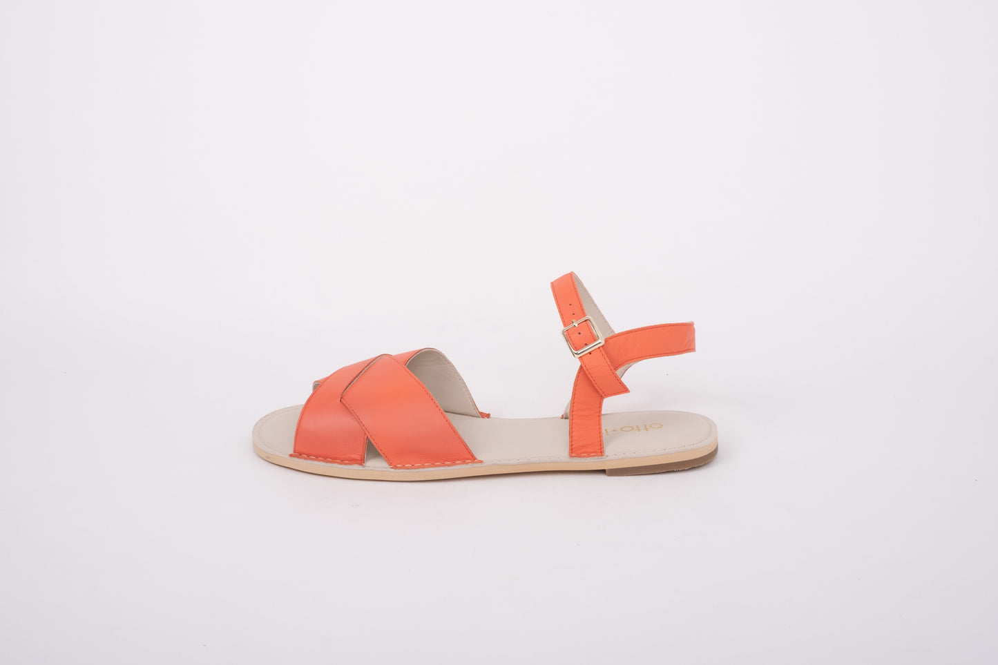Side shot of womens large size orange coral leather sandal sizes 8 9 10 11 12