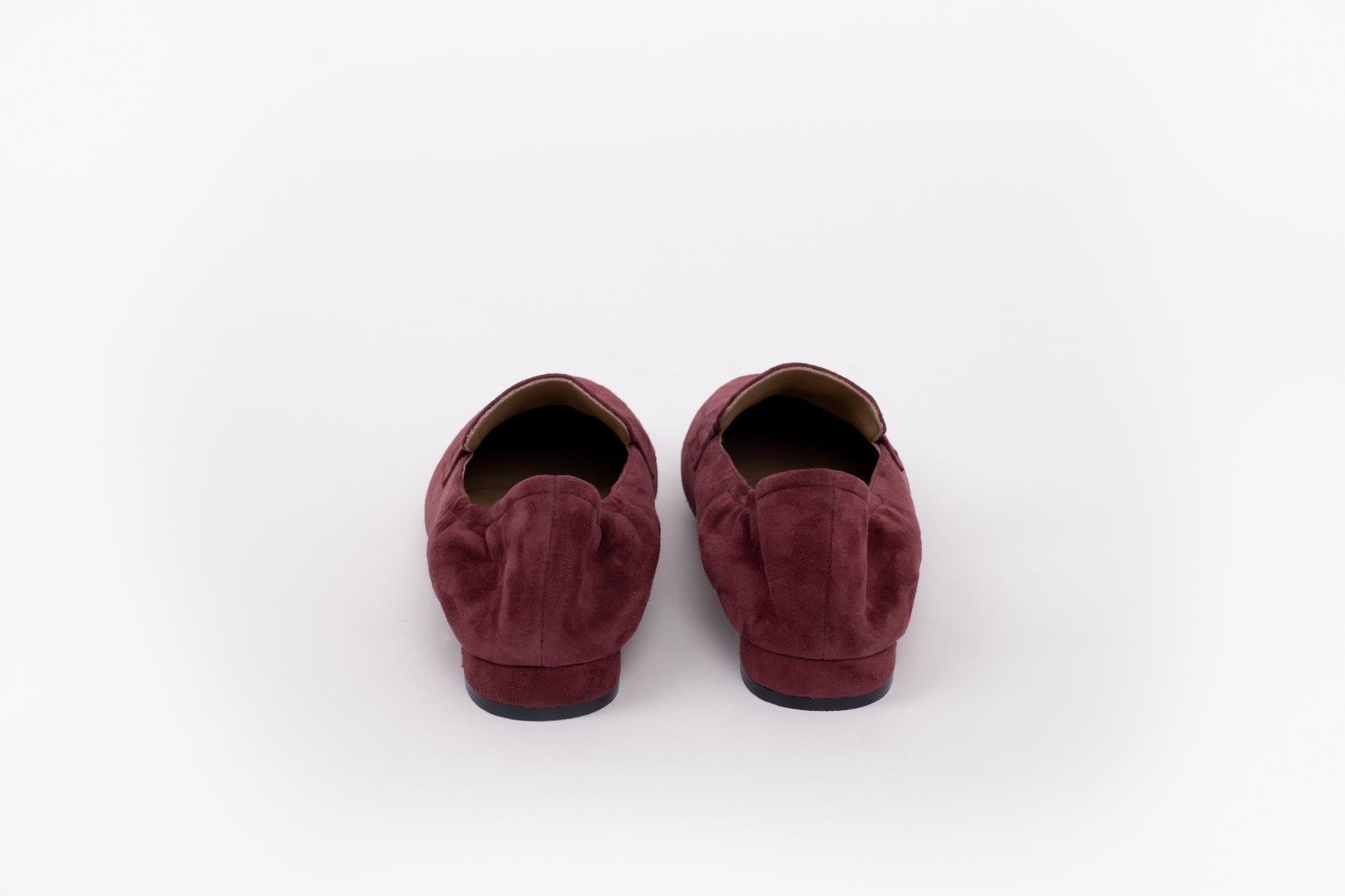 Back shot of womens large sized flat loafer shoe for big feet in sizes 8 9 10 11 12