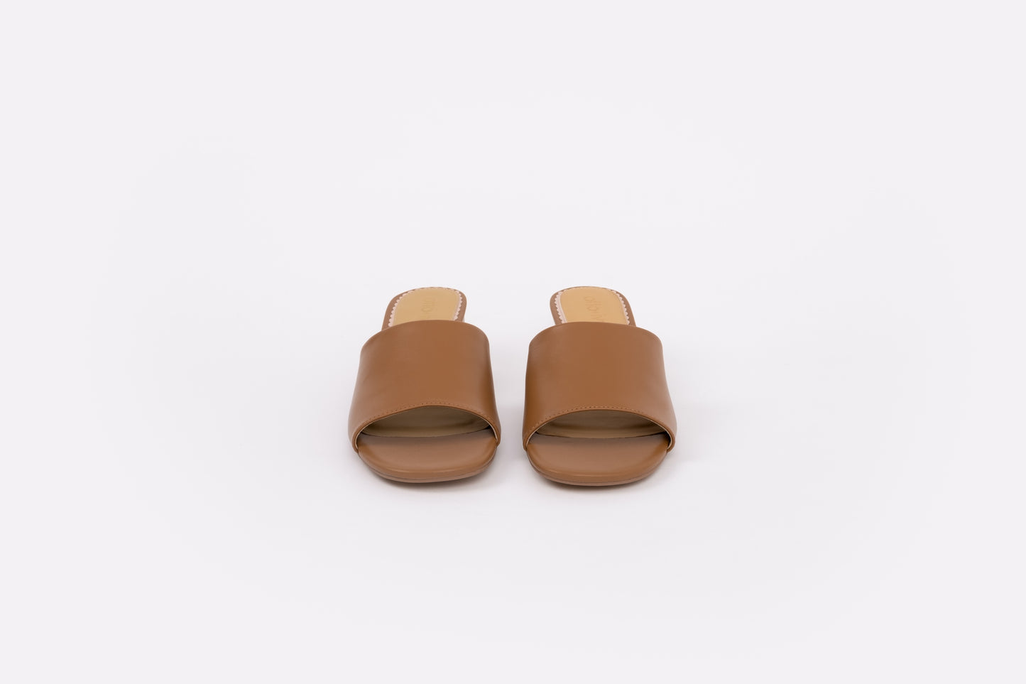 Front shot of tan leather heeled sandal win womens larger sizes 8-12
