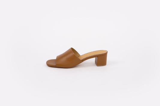 Side shot of tan leather sandal available in larger womens sizes 8 9 10 11 12