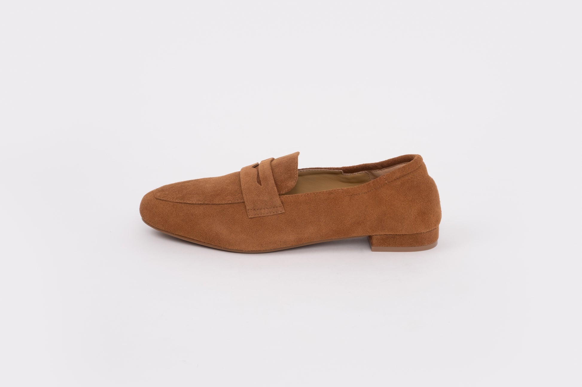 Large sized womens Brown suede loafer shoe on a white background