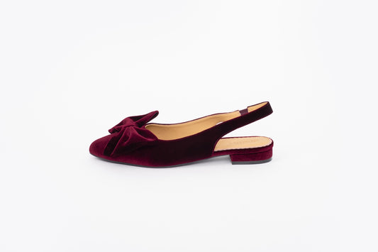 Side shot of womens flat berry velvet bow slingback shoe. Available in UK sizes 8 9 10 11 12