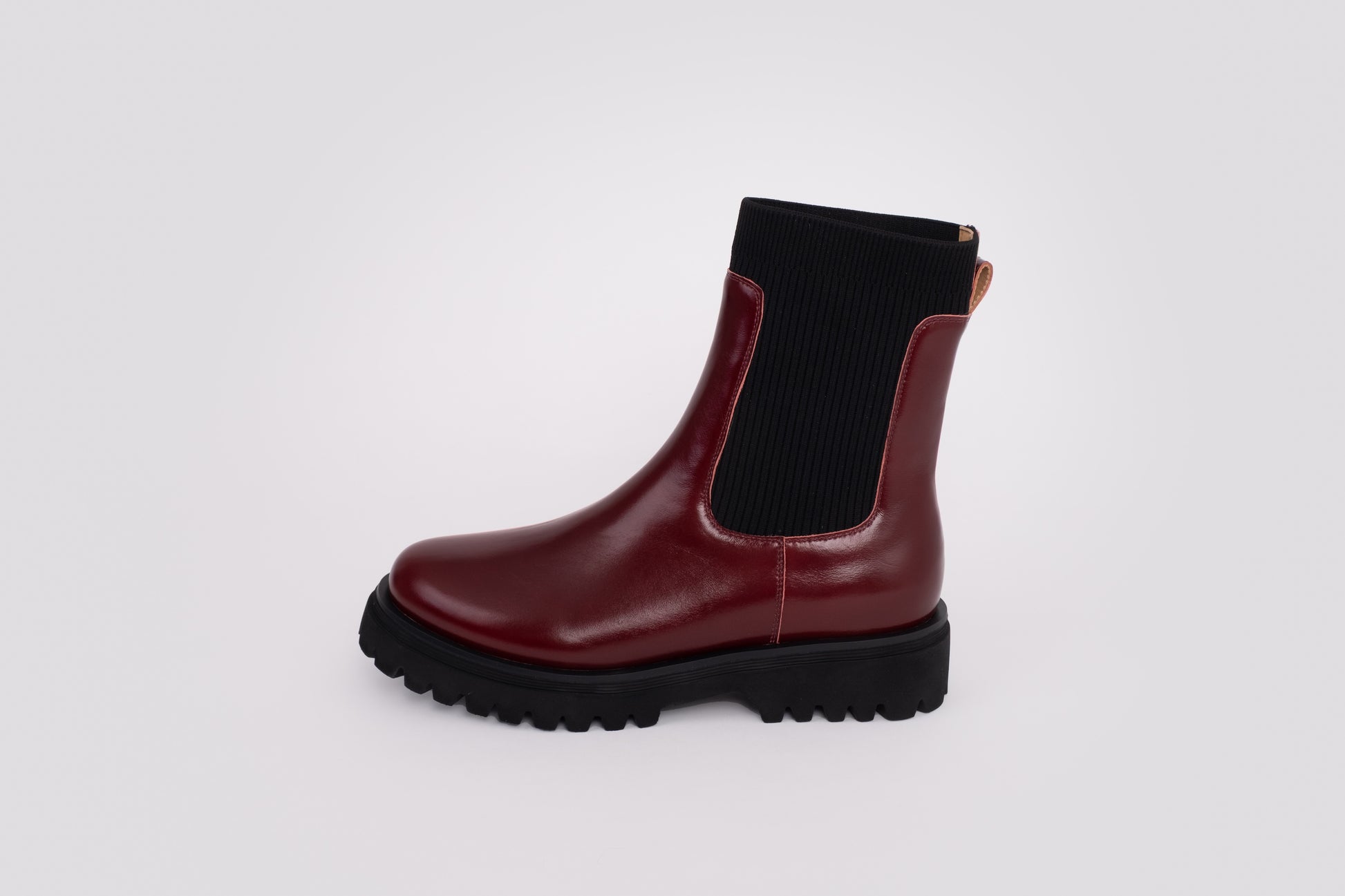 Side profile of womens chunky ankle boot Marnie, in red oxblood leather available in larger sizes 42-46
