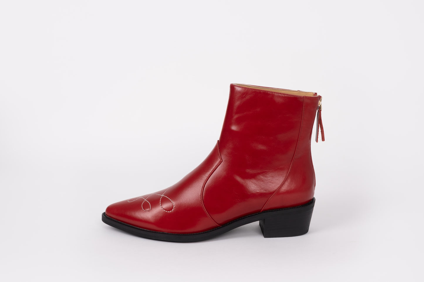 Side profile of Phoebe boot in red, cowboy style ankle boot in leather. Available in larger sizes 42-46