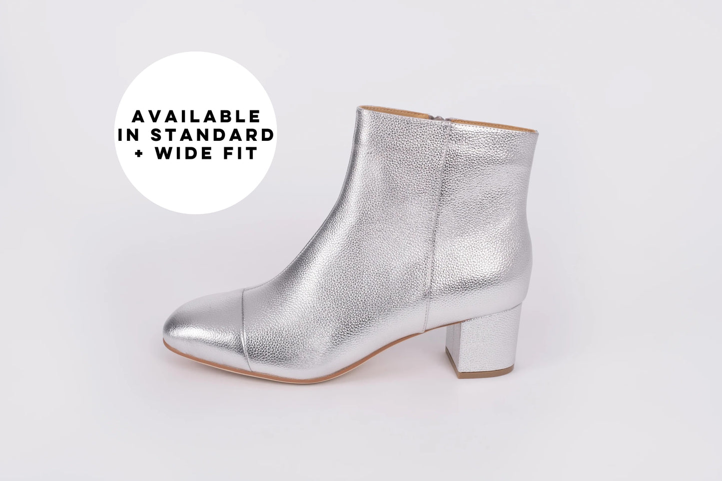 Side profile of womens silver heeled ankle boot available in larger sizes UK 8-12