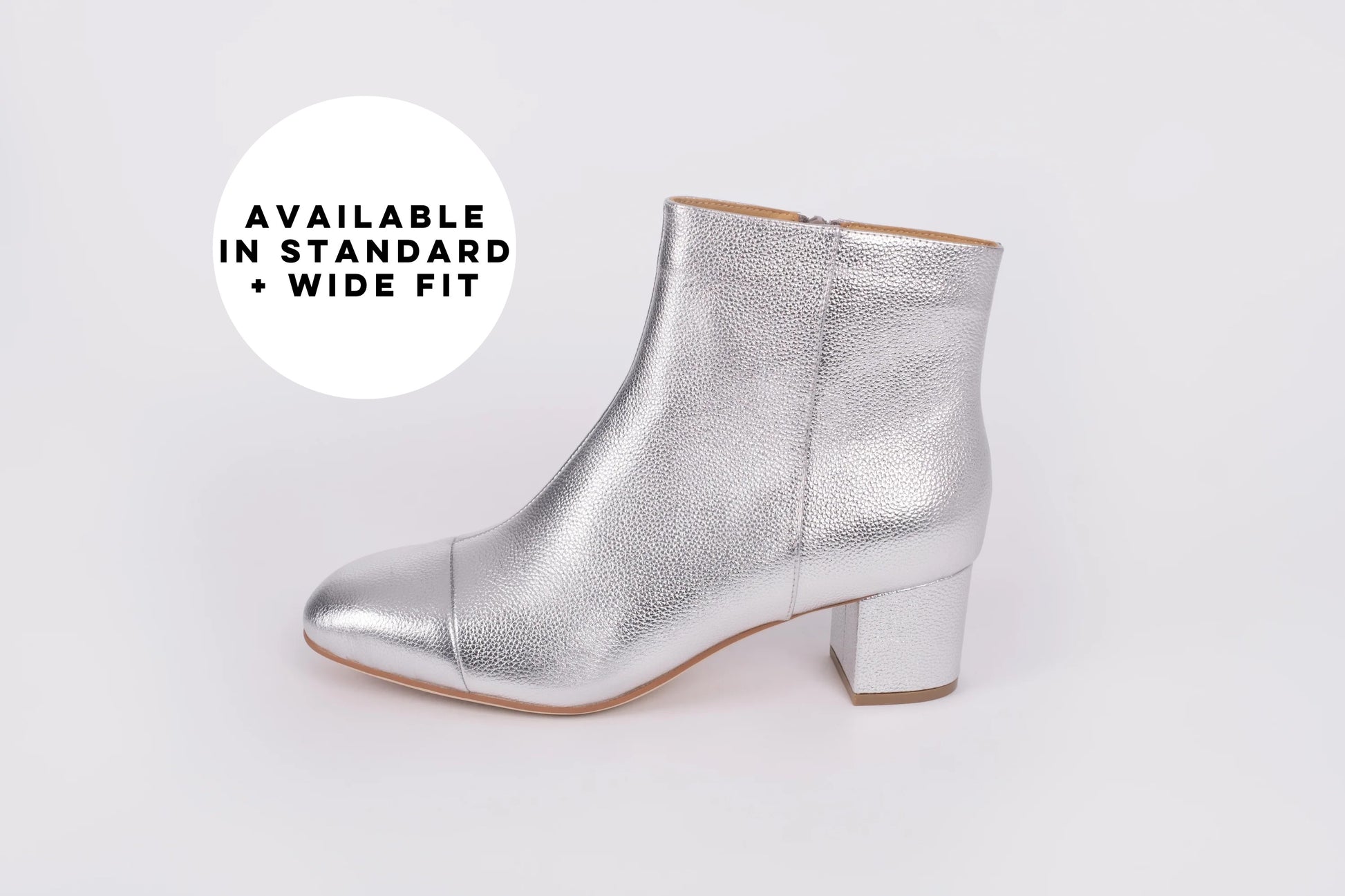 Side profile of womens silver heeled ankle boot available in larger sizes UK 8-12