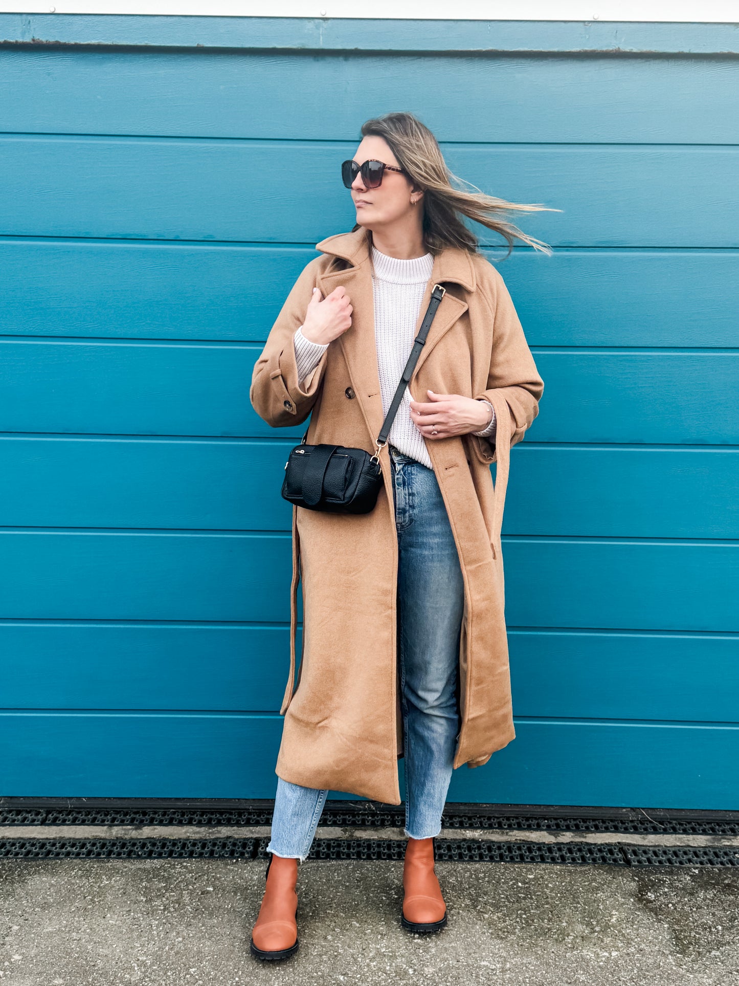 Real life model wearing brown Chelsea boots in larger sizes 42-46