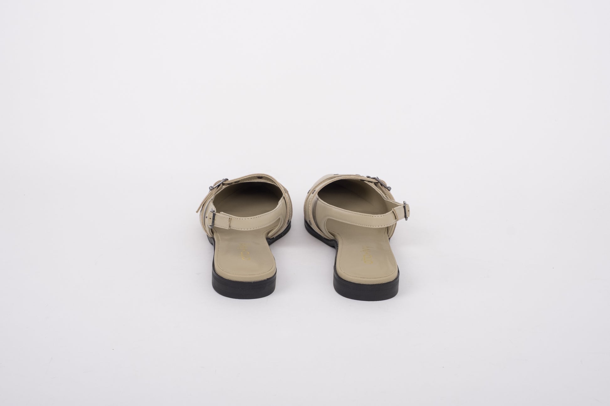 Back shot of womens beige leather slingback flat shoe in large sizes 8-12