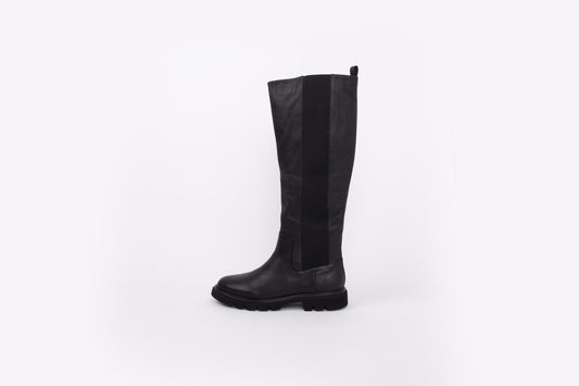 side shot of womens knee high leather flat  black boot available in larger sizes 42 43 44 45 46