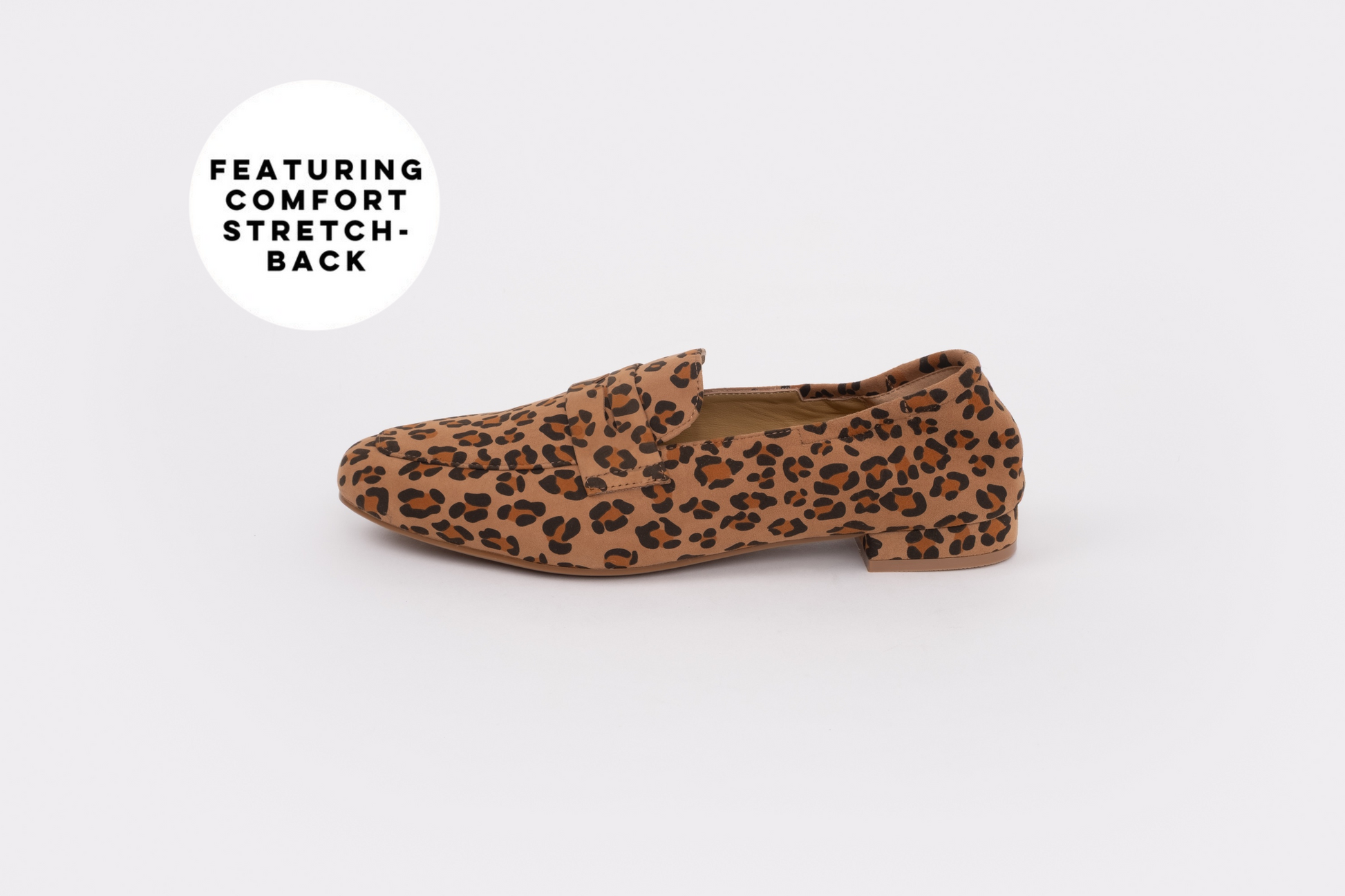 large sized Leopard print loafer shoe on a white background with text 'Featuring Comfort Stretch'.