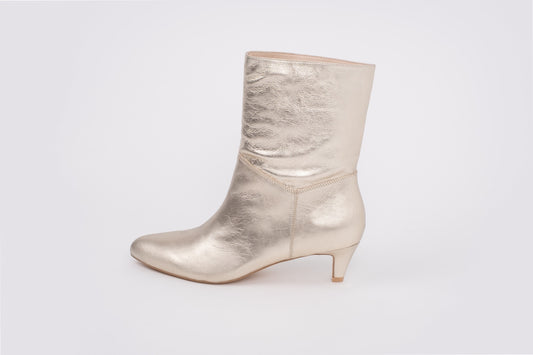 side shot of gold womens leather boot in larger sizes 8-12
