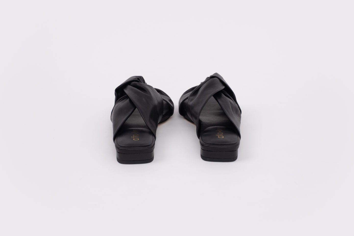 back shot of large sized black leather sandal in large womens sizes 42-46