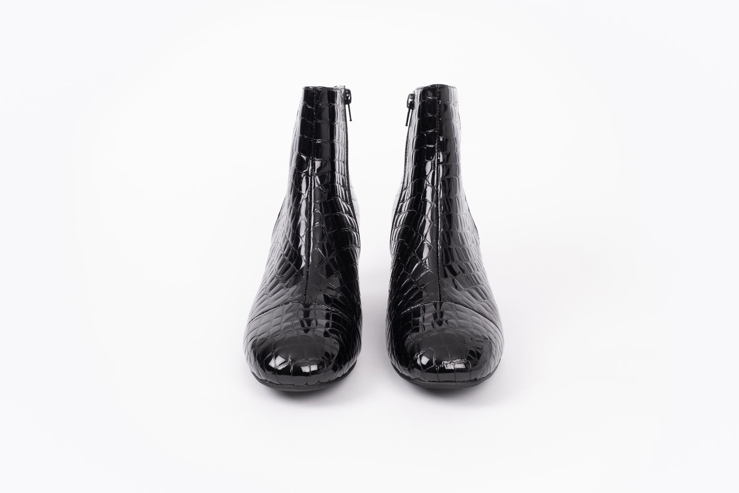 Izzy Boot by Otto + Ivy - a front profile of a black boot for tall women with large feet, featuring glossy black croc leather and a low chunky heel.