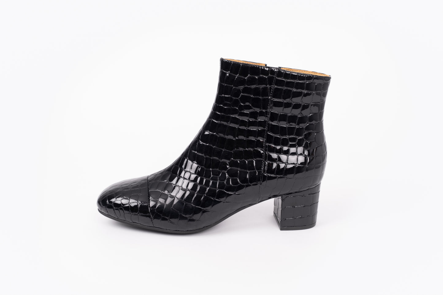 Izzy Boot by Otto + Ivy - a side profile of a black boot for tall women with large feet, featuring glossy black croc leather and a low chunky heel.