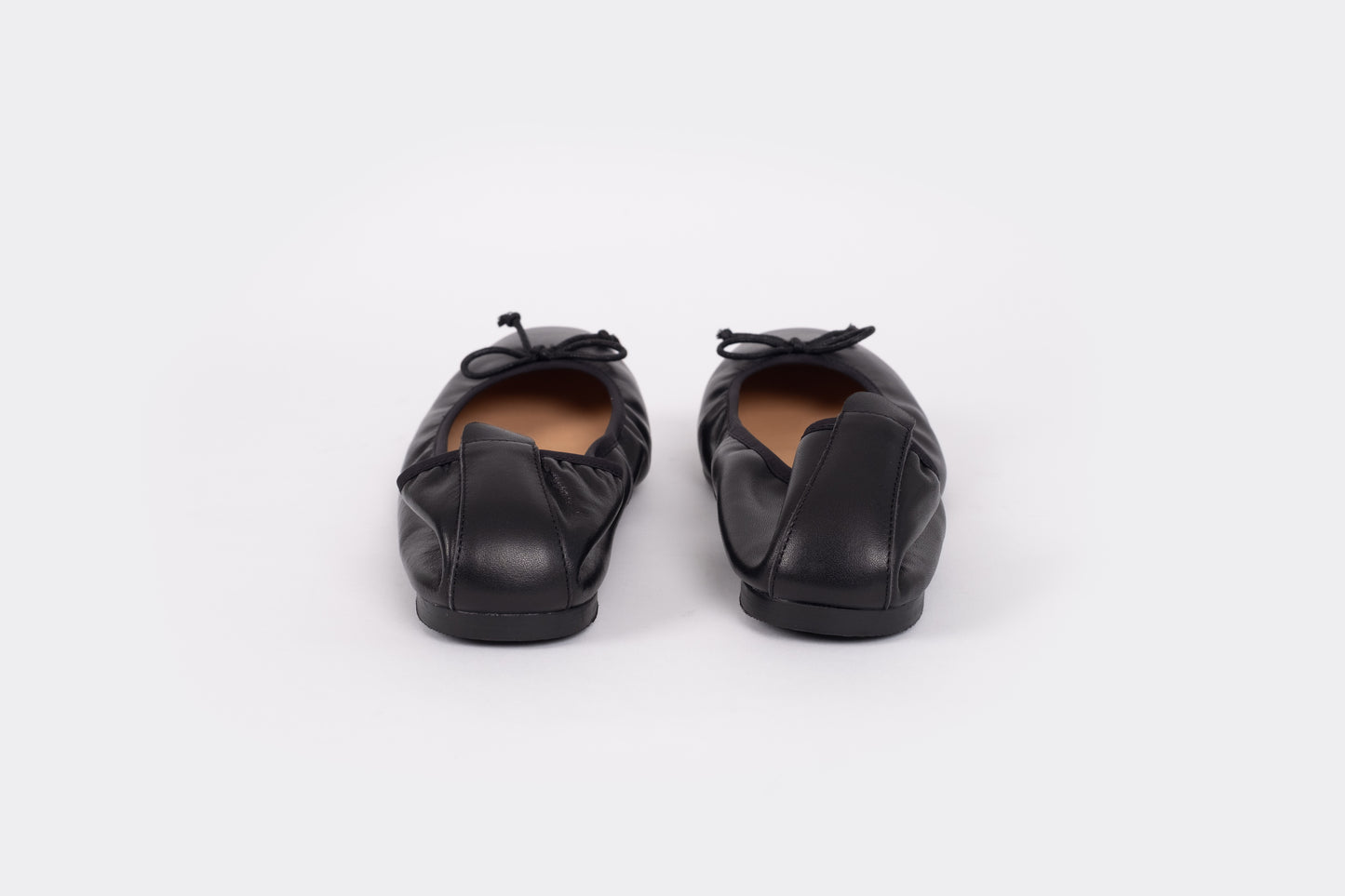 Back view of Olivia Flats in black. An elasticated leather womens flat available in large womens European sizes 42-46