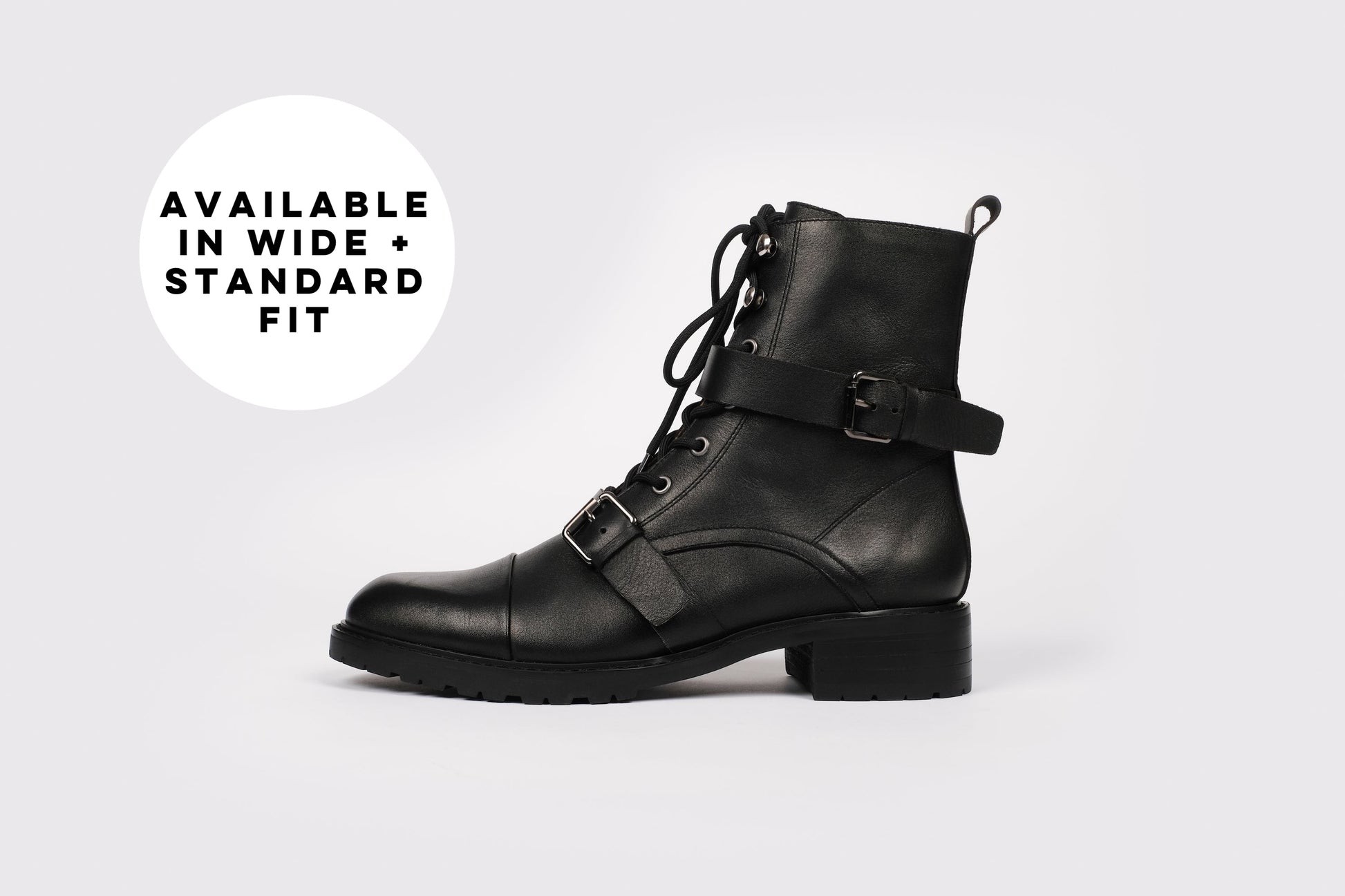 Maisie Boot by Otto and Ivy -  a side profile of a black biker boot for tall women with large feet, featuring silver buckles and black laces.