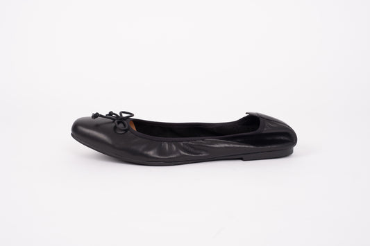 Side profile of Olivia Flat, a black leather pump with elasticated back. Womens large sizes shoes in European 42-46